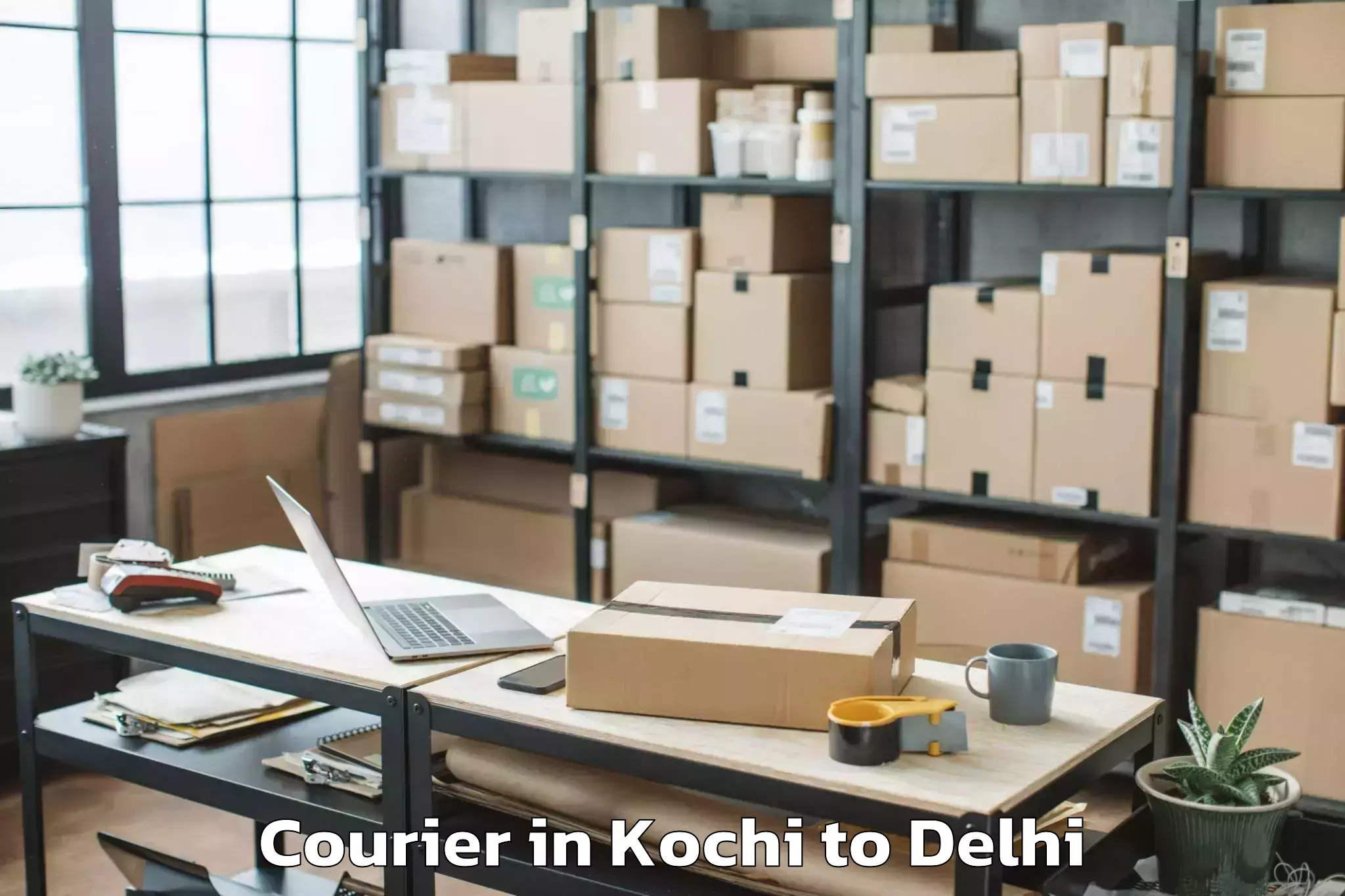 Easy Kochi to Naraina Industrial Estate Courier Booking